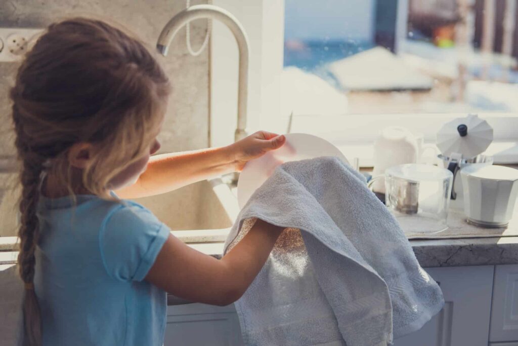 Kids cleaning dishes